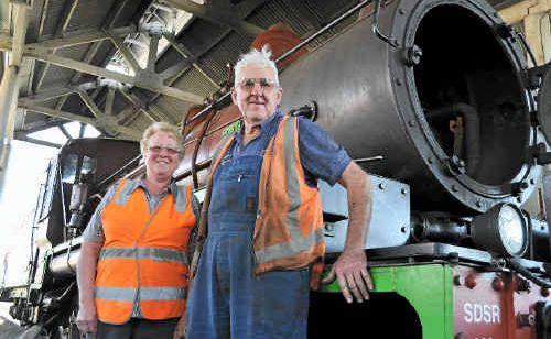 Southern Downs Steam Railway president Christine Ford, with steam fitter John Brady, with the newly-fixed steam train. Southern Downs Steam Railway president Christine Ford, with steam fitter John Brady, with the newly-fixed steam train.